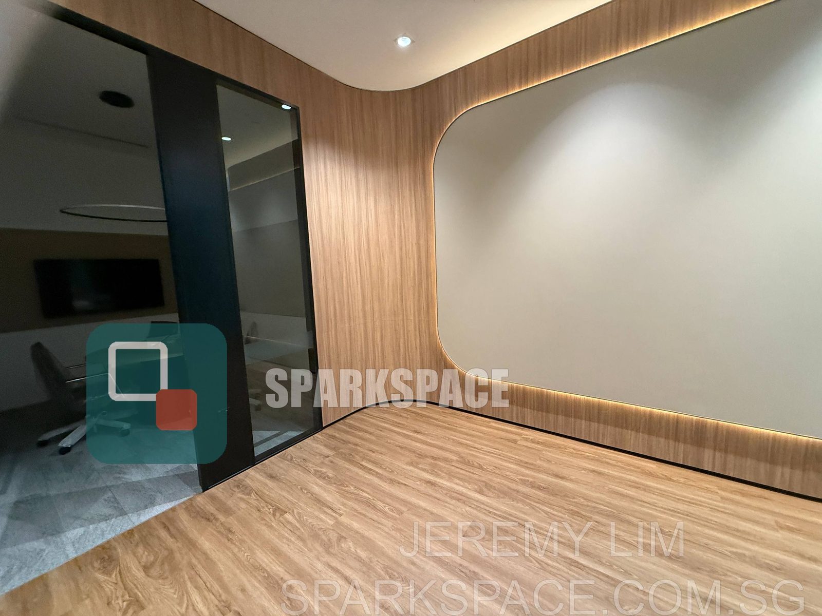 Open-plan fitted office workspace with meeting rooms at Keppel South Central