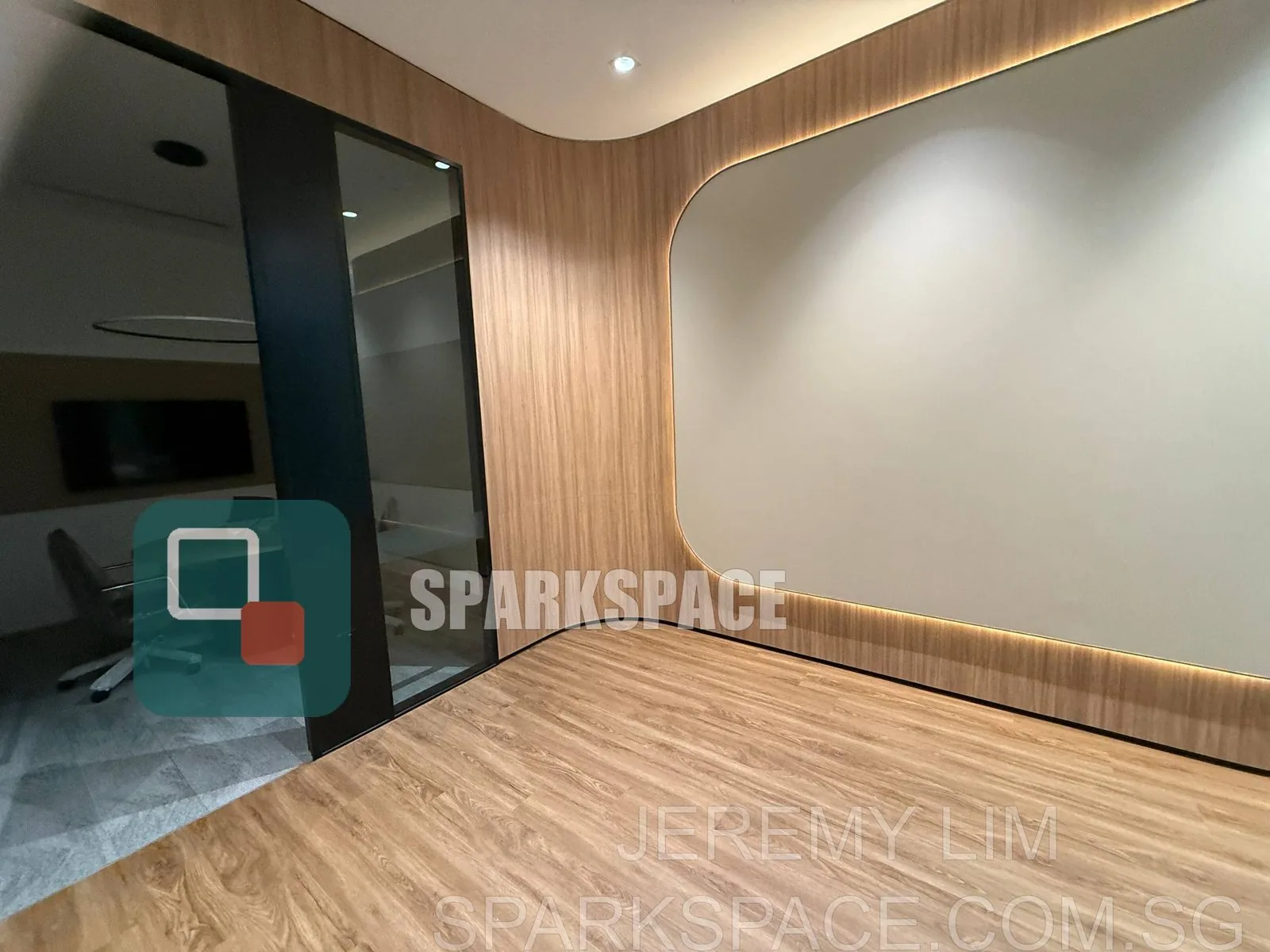 Open-plan fitted office workspace with meeting rooms at Keppel South Central