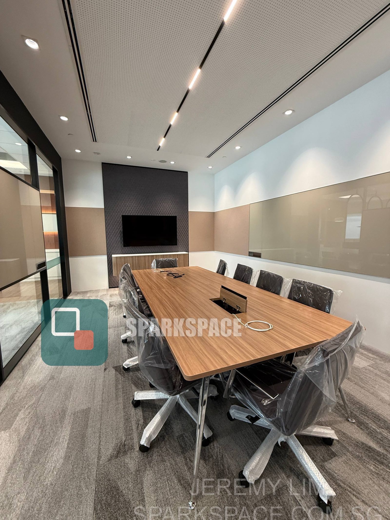 Fitted boardroom with timber table and AV at Keppel South Central Level 14