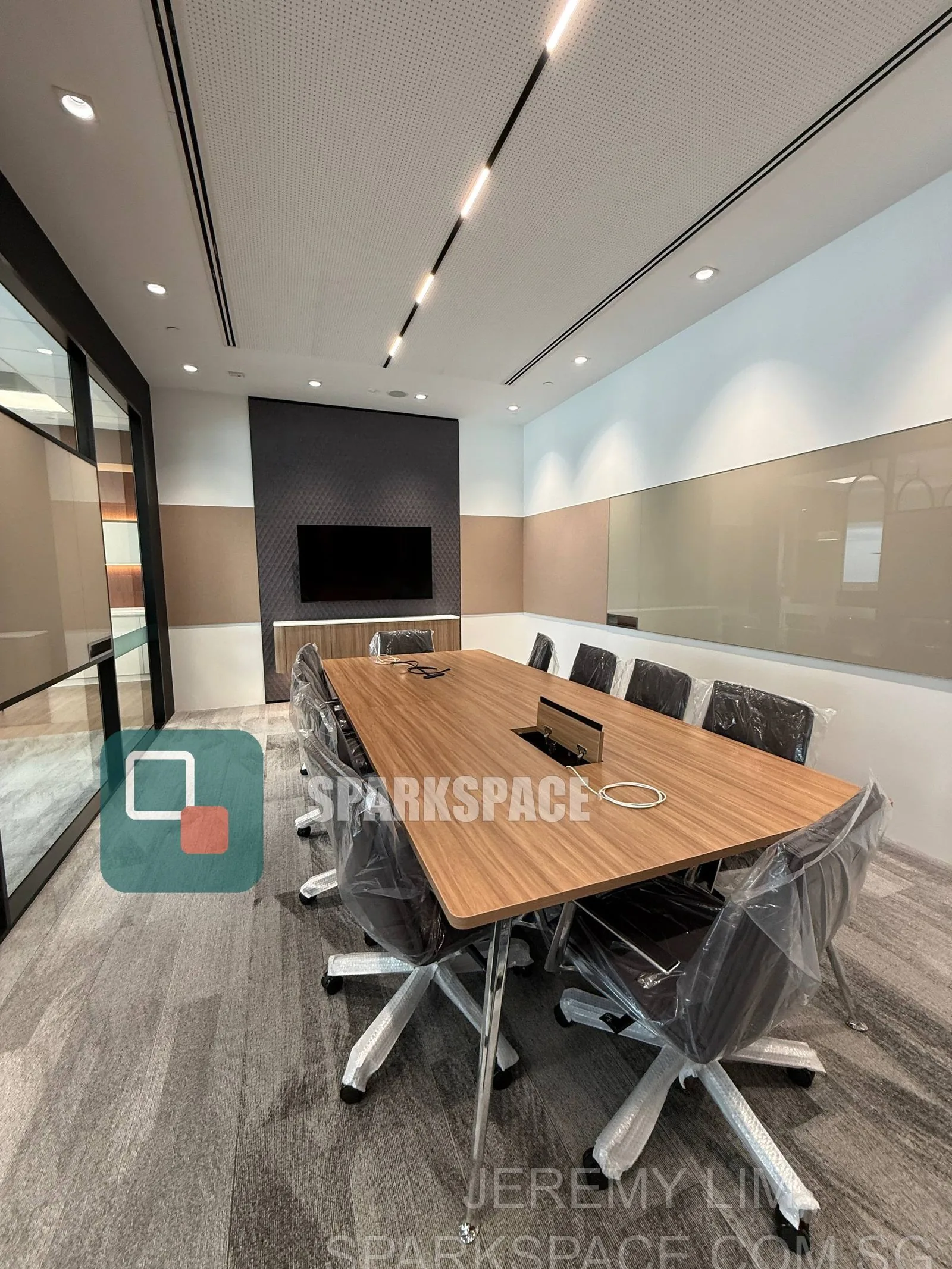 Fitted boardroom with timber table and AV at Keppel South Central Level 14